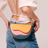 Fashionable New Handbag Design Turkish Curve Wave Contrast Color Messenger Saddle Bag Made of PU Material Women's New Handbag
